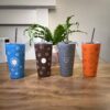 Sunflower, Hedgehog, Star and Pumpkin Ceesy mugs next to each other